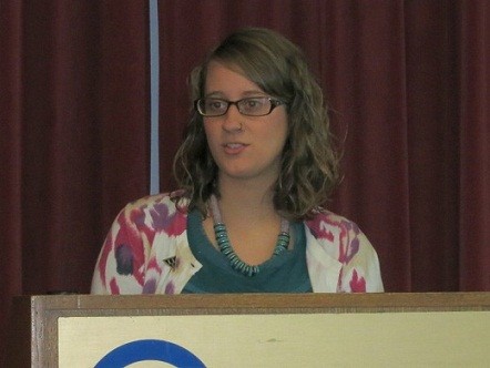 Student gives address at event.